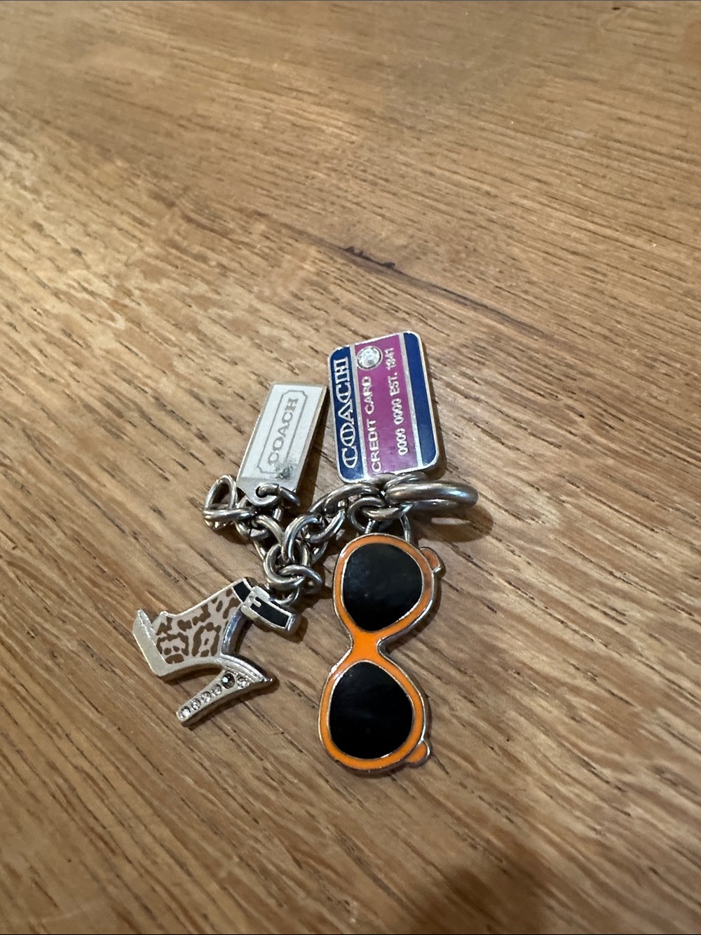 Coach Silver-Tone Keychain with Orange & Black Sunglasses Charm